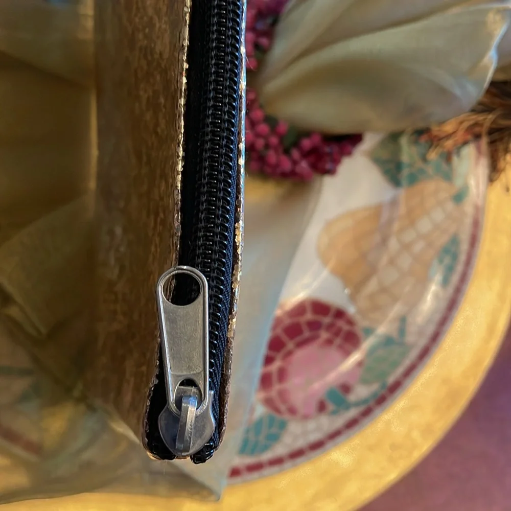 Gold metallic top zip cosmetic or inside purse bag. GUC “Hello Gorgeous”
